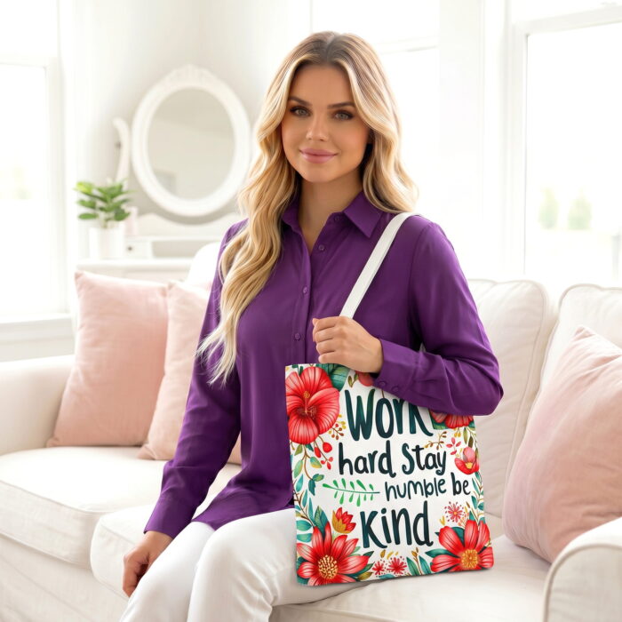 A_woman_with_blonde_wavy_202606240039 (2) Work Hard Stay Humble Floral Tote Bag – Inspirational Print - Image 1